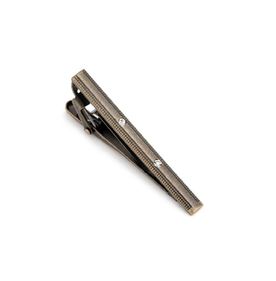 Bronze tie clip on a white background
