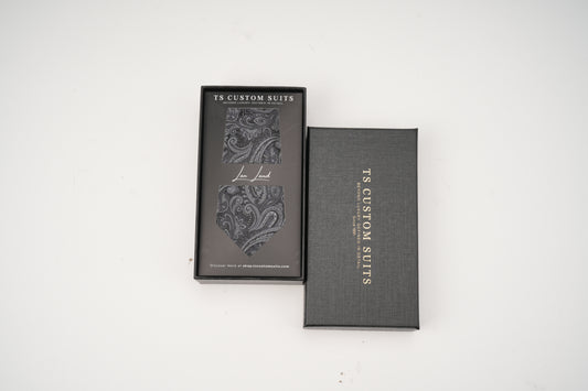 Dark gray tie in the box