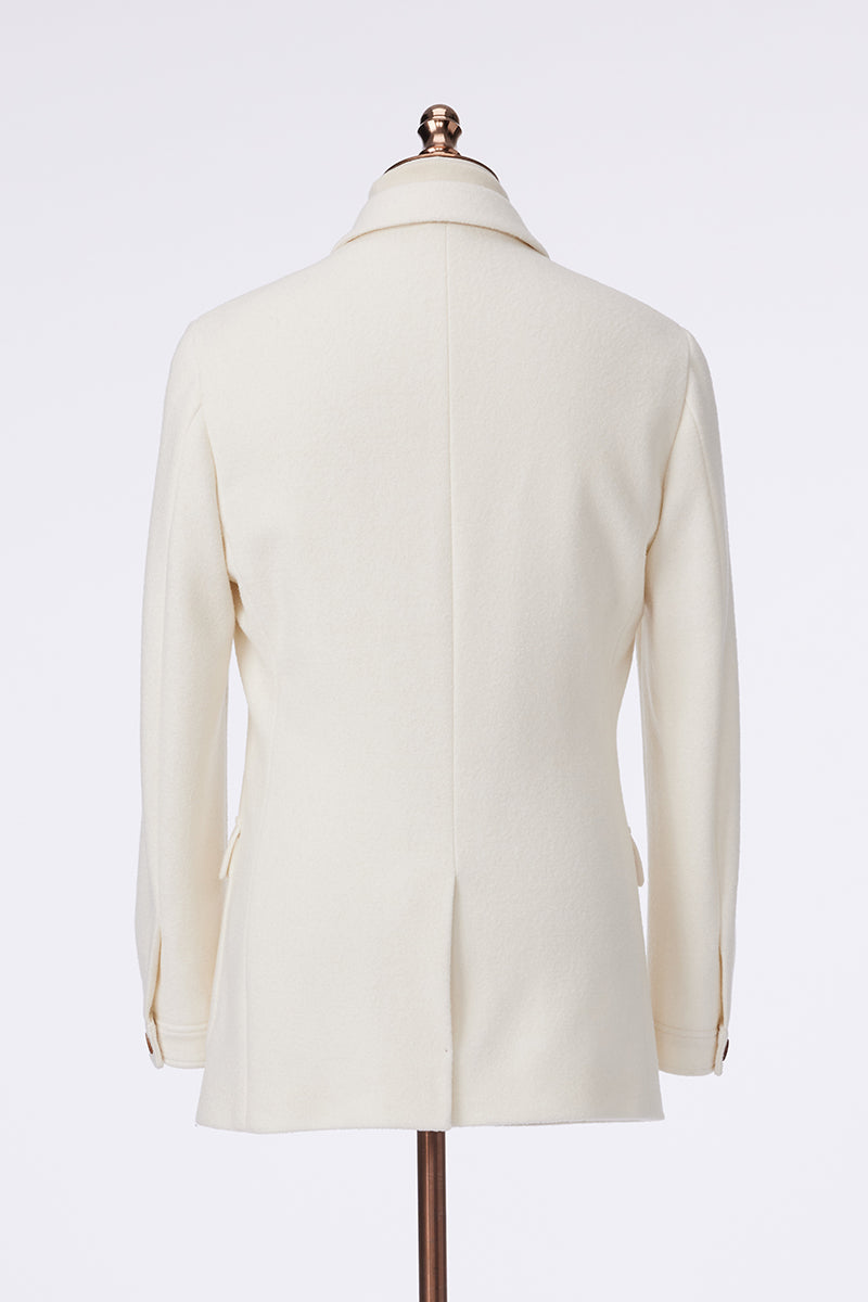 White blazer on a mannequin against a white background