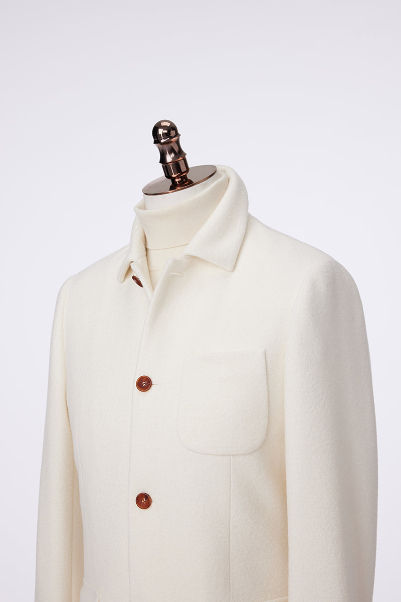 White coat on a mannequin with a white background