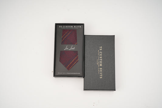 Two gray boxes with 'TC Custom Suits' branding on a white background