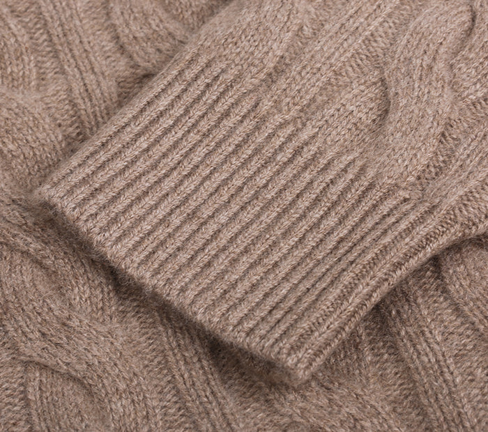 Close-up of a brown cable cashmere cardigan