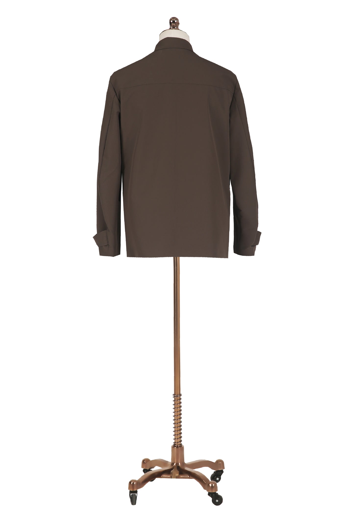 Brown jacket on a mannequin with a wooden base against a white background