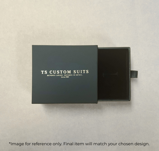 Black box with 'TS Custom Suits' branding on a light gray background
