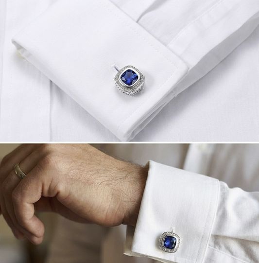 image of beautiful luxury blue onyx cuff links on a white dress shirt.