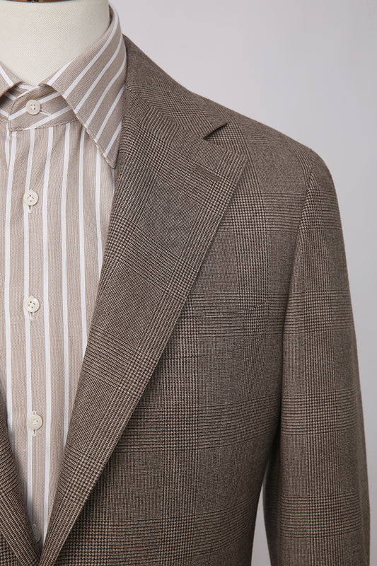 Brown checkered blazer over a striped shirt on a mannequin against a gray background