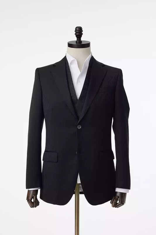 Black wedding suit with notch lapels and an accent vest. Unique design in the fabric. Black suit for groom. Black wedding suit. Groom black wedding suit traditional notch lapel.