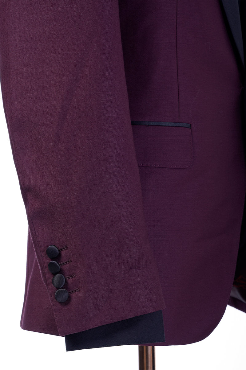 Burgundy tuxedo jacket with black satin shawl lapel. Burgundy vest and pants pictured. Burgundy wedding tuxedo. Groom burgundy suit. Maroon wedding tuxedo. Maroon tux. Burgundy wedding tuxedo. Maroon wedding tux. Formal burgundy tux.