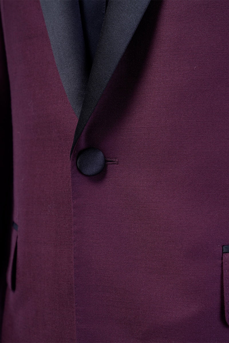 Burgundy tuxedo jacket with black satin shawl lapel. Burgundy vest and pants pictured. Burgundy wedding tuxedo. Groom burgundy suit. Maroon wedding tuxedo. Maroon tux. Burgundy wedding tuxedo. Maroon wedding tux. Formal burgundy tux.