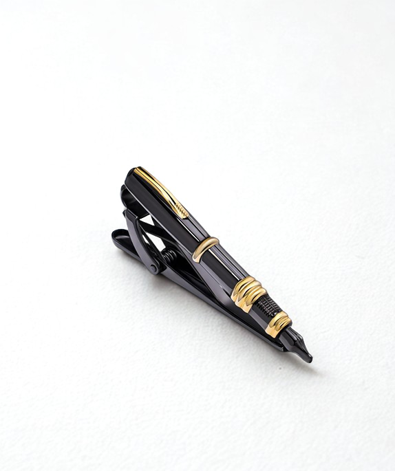 Black and gold pen on a white background