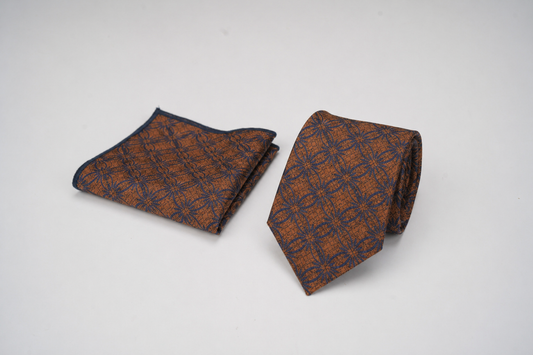 brown tie and matching pocket square