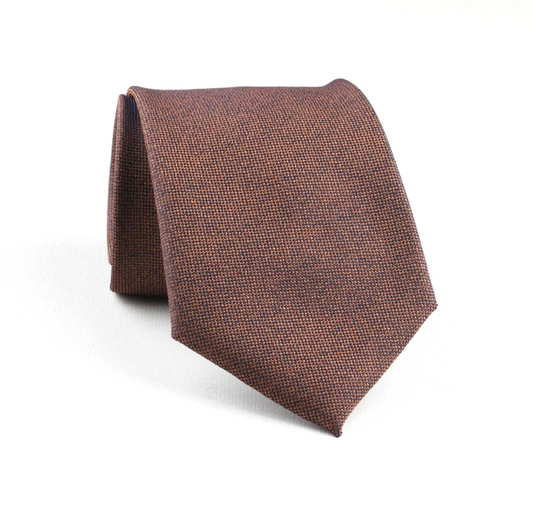 Brown textured tie on a white background