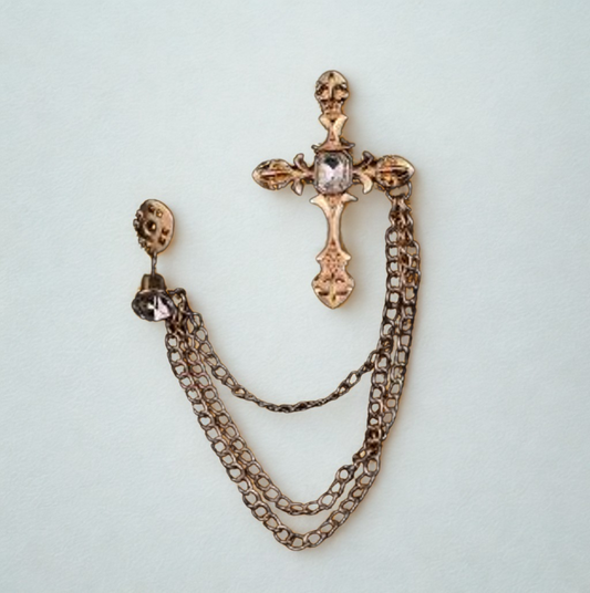 A brooch with cross pendant, and chain