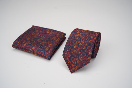 Patterned tie and pocket square set on a white background
