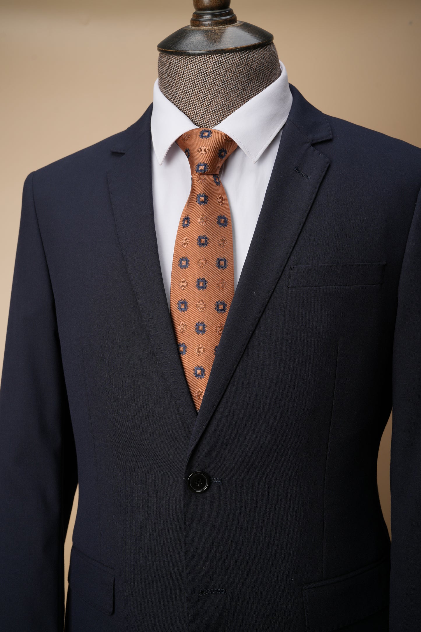 Rust silk tie on a suit