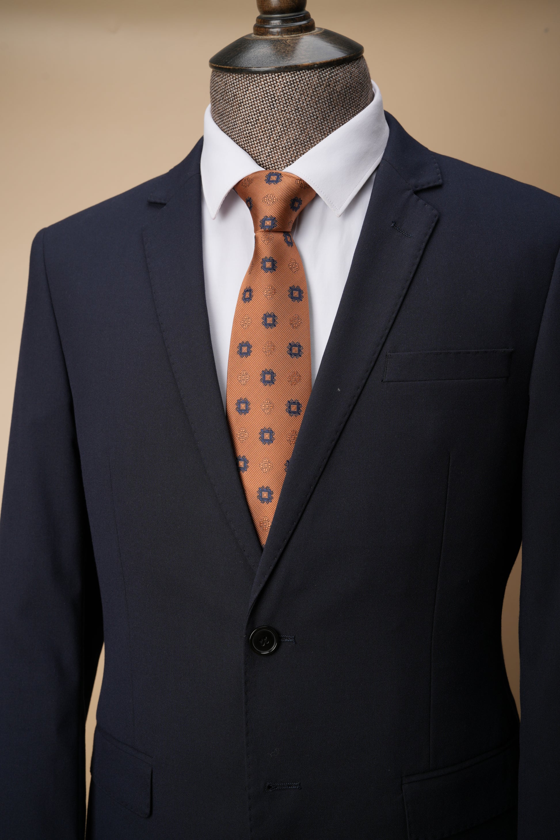 Rust silk tie on a suit