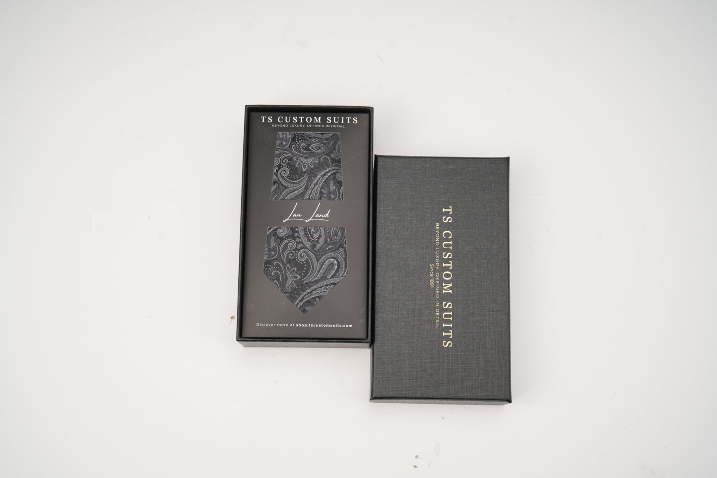 Dark gray tie in the box