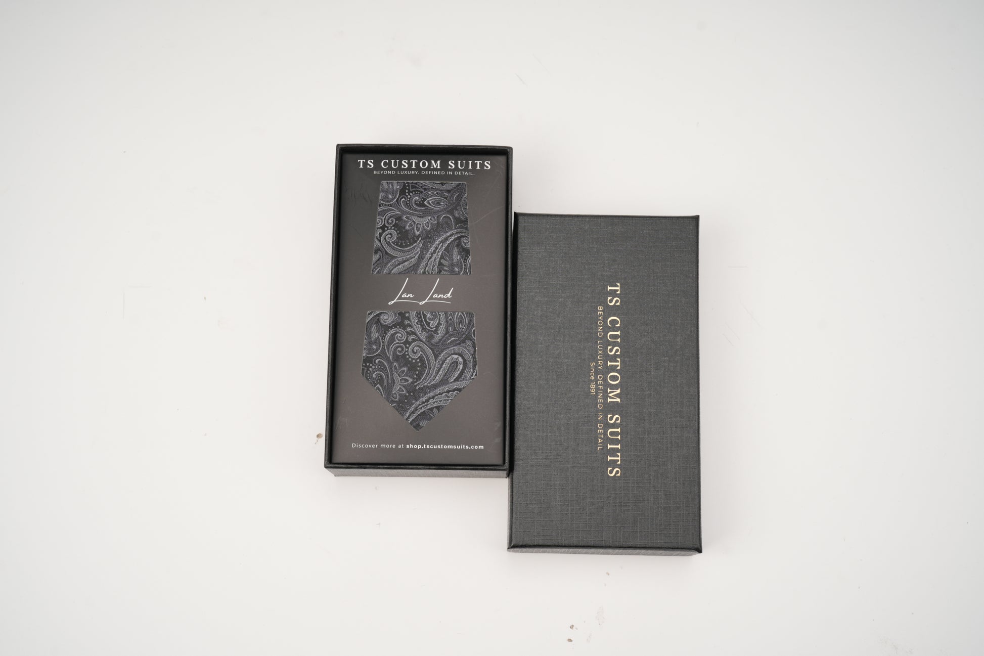Dark gray tie in the box