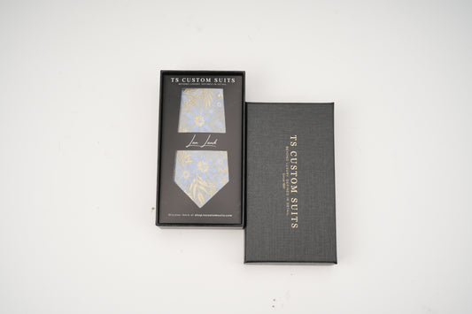 TS Custom Suits tie and box on a white background
