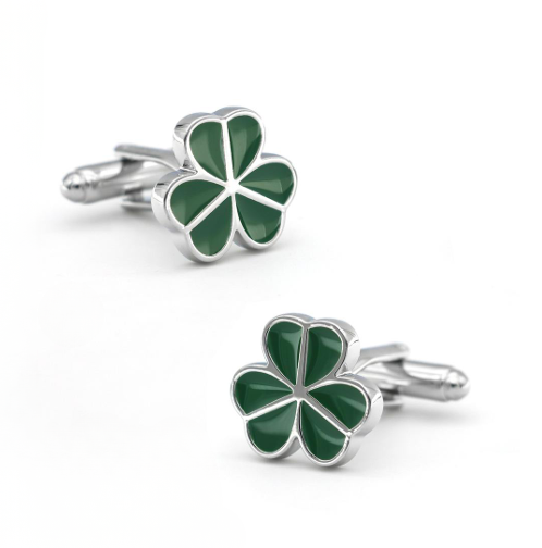 Green four-leaf clover cufflinks on a white background