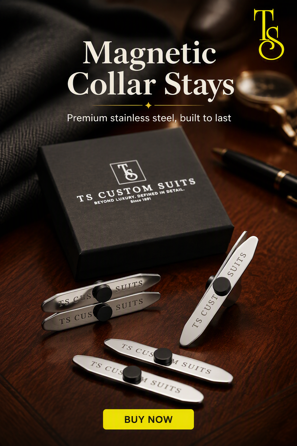 Five silver magnetic collar stays with black center magnets are displayed on a dark wooden table next to their black branded box. The background includes a dark suit jacket and a gold watch, with text overlays reading 'Magnetic Collar Stays' and 'TS Custom Suits'.