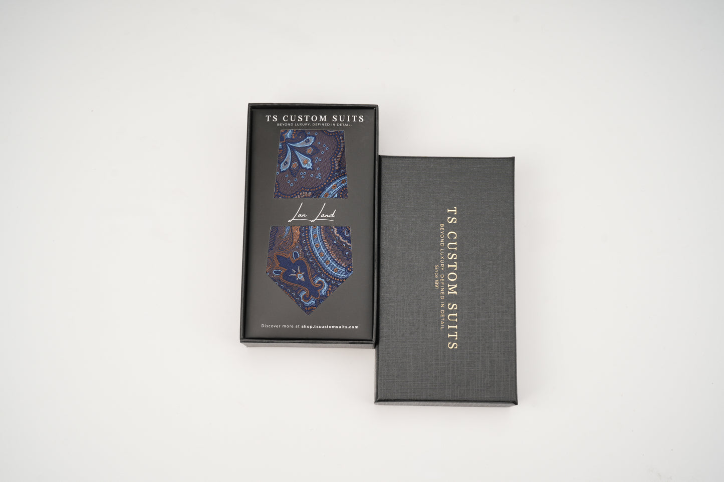 Navy paisley tie in the box