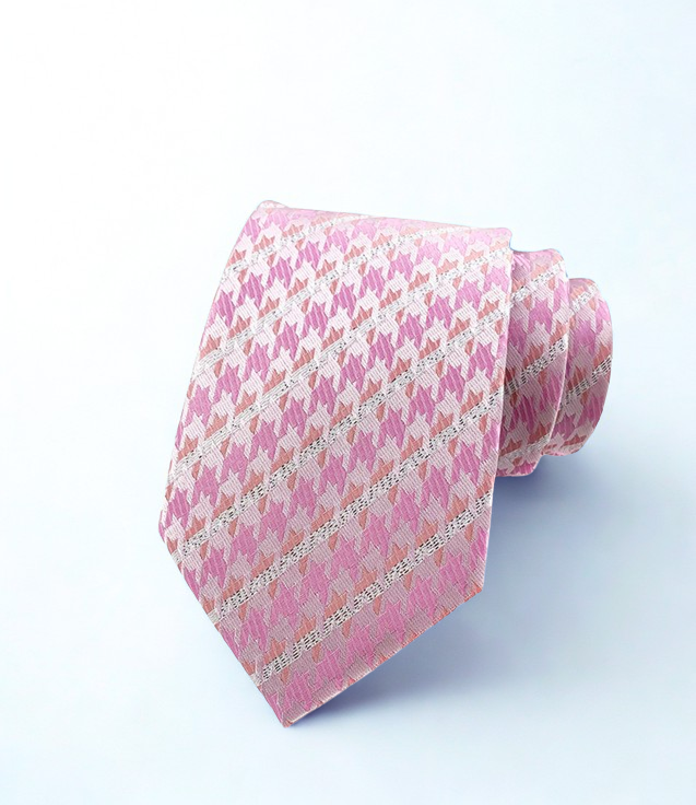 Pink patterned tie on a light gray background