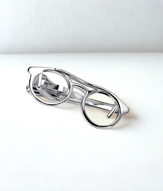Silver eyeglasses on a white background