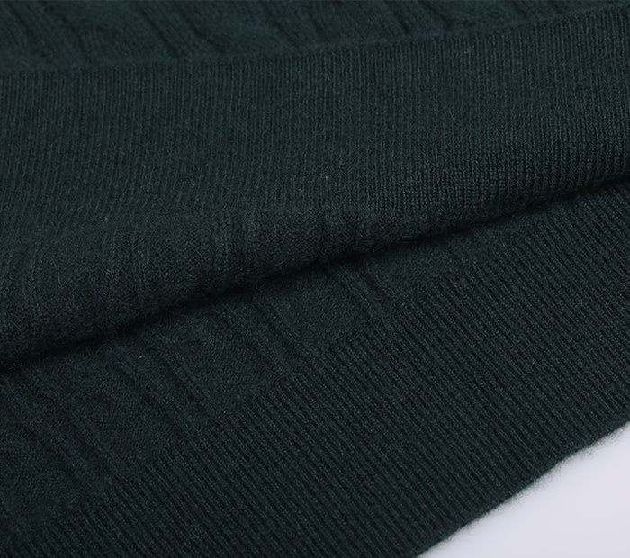Close-up of dark green cashmere sweater