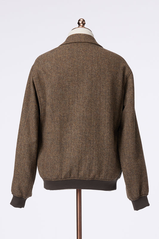 Brown jacket on a mannequin against a white background