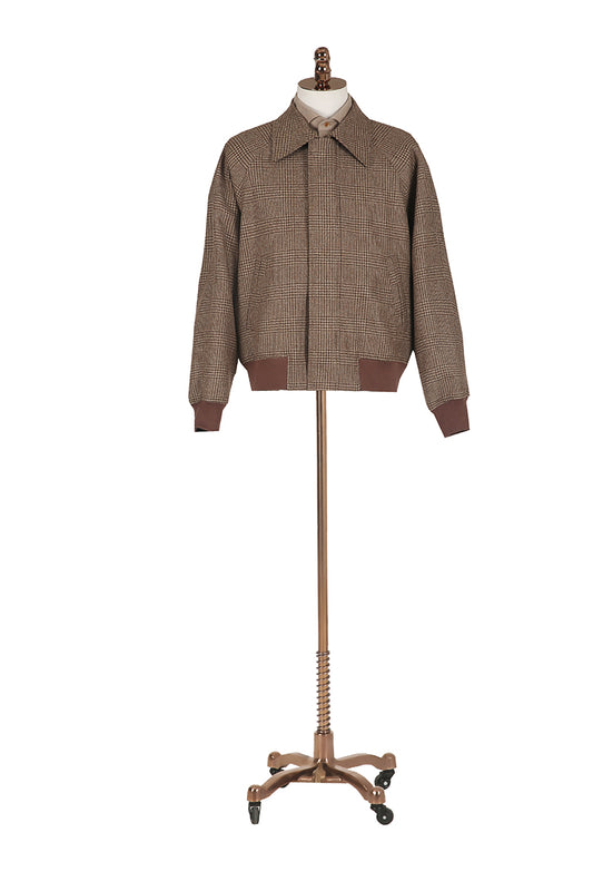 Brown checkered jacket on a mannequin with a white background