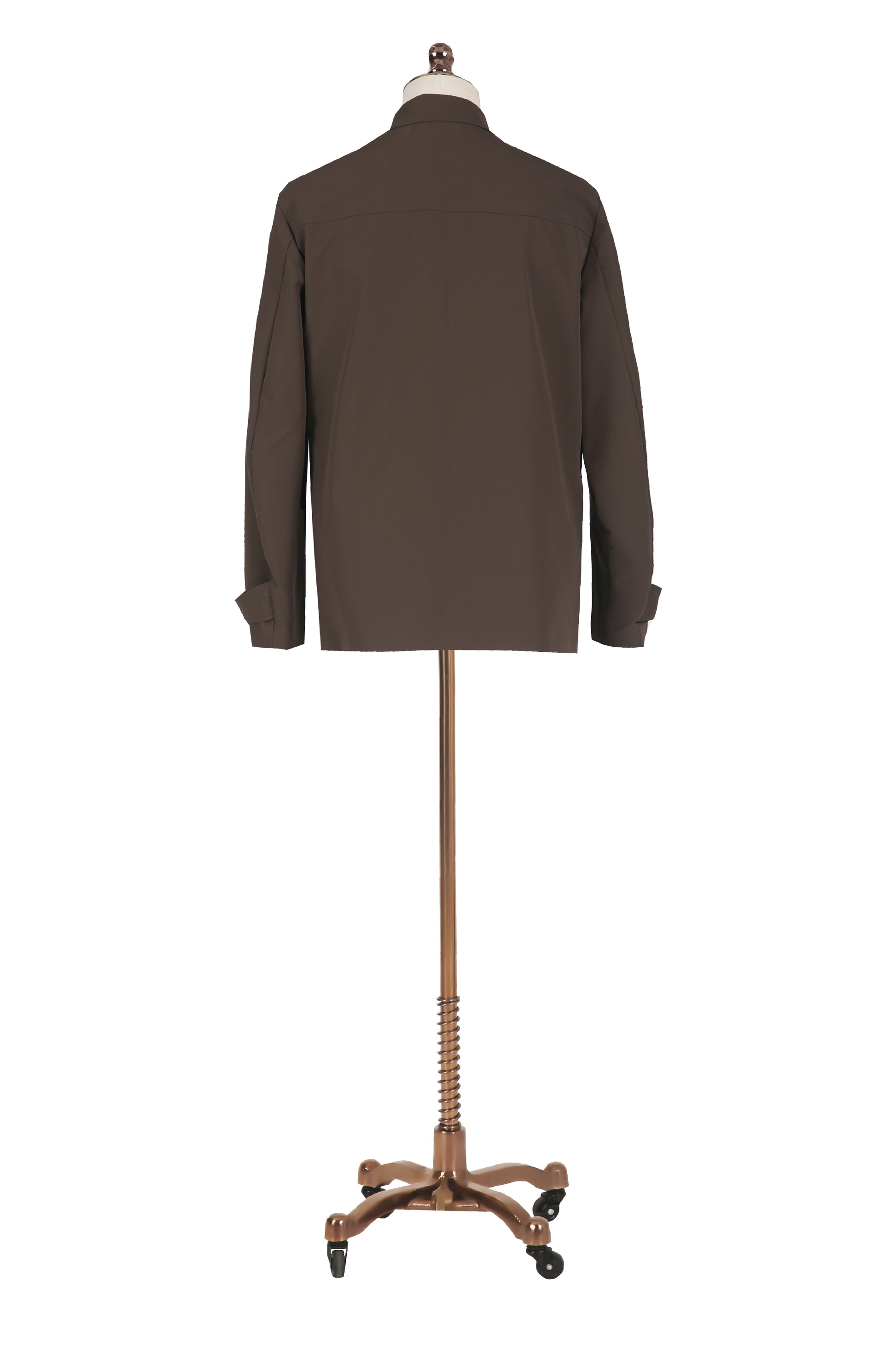 Brown jacket on a mannequin with a wooden base against a white background