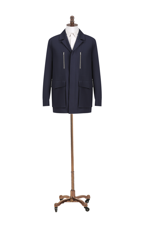 Navy blue coat on a mannequin against a white background
