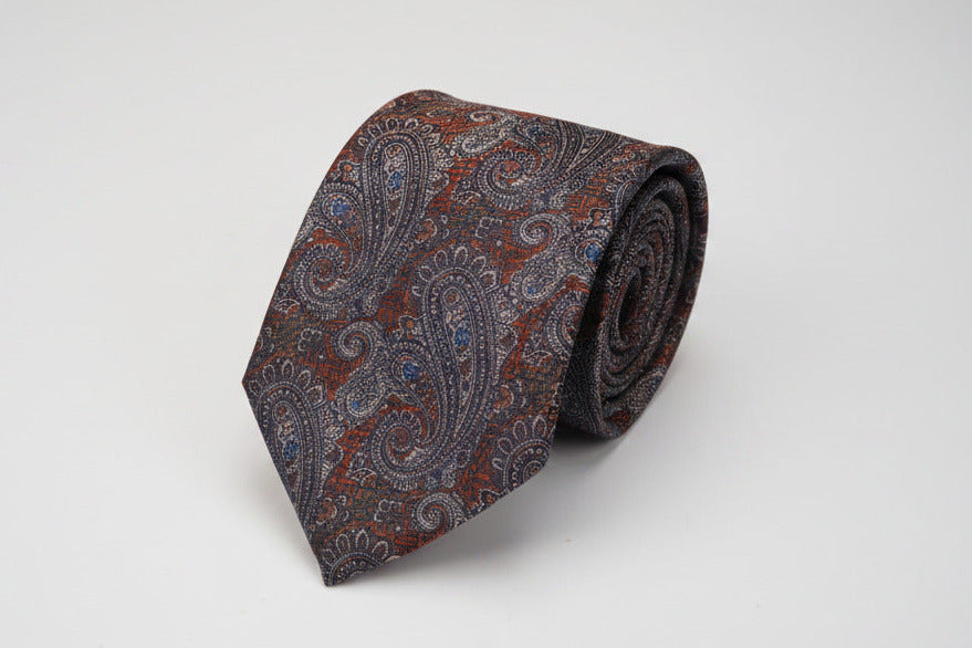 brown paisley tie on a white background
