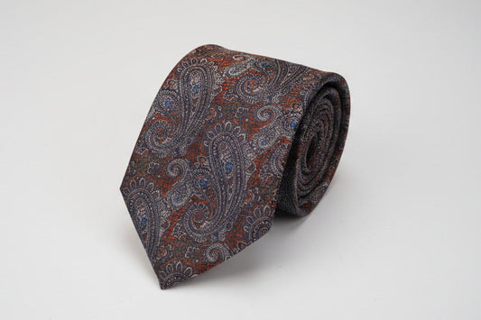 brown paisley tie on a white background