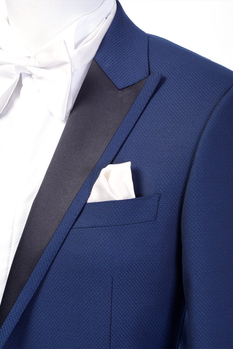 Navy wedding tuxedo with black satin peak lapel. Single breasted navy tux with black satin accents. 2-piece navy wedding tuxedo. Custom navy tuxedo for wedding