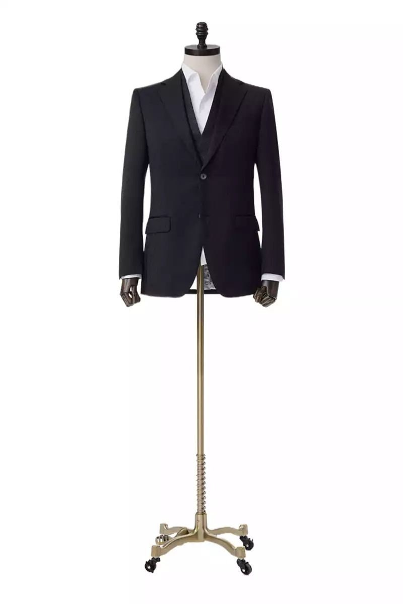 Black wedding suit with notch lapels and an accent vest. Unique design in the fabric. Black suit for groom. Black wedding suit. Groom black wedding suit traditional notch lapel.