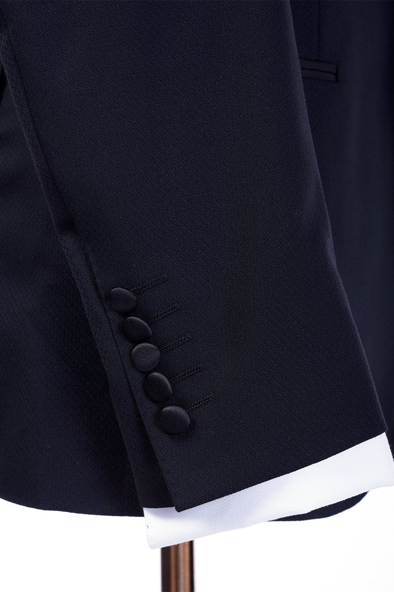 Midnight blue navy tuxedo with black satin shawl lapel. navy blue tuxedo pants with black satin stripe. Black satin covered buttons on this midnight blue dark navy blue tuxedo. Formal wedding tuxedo. Formal wedding tux. Elegant tuxedo.