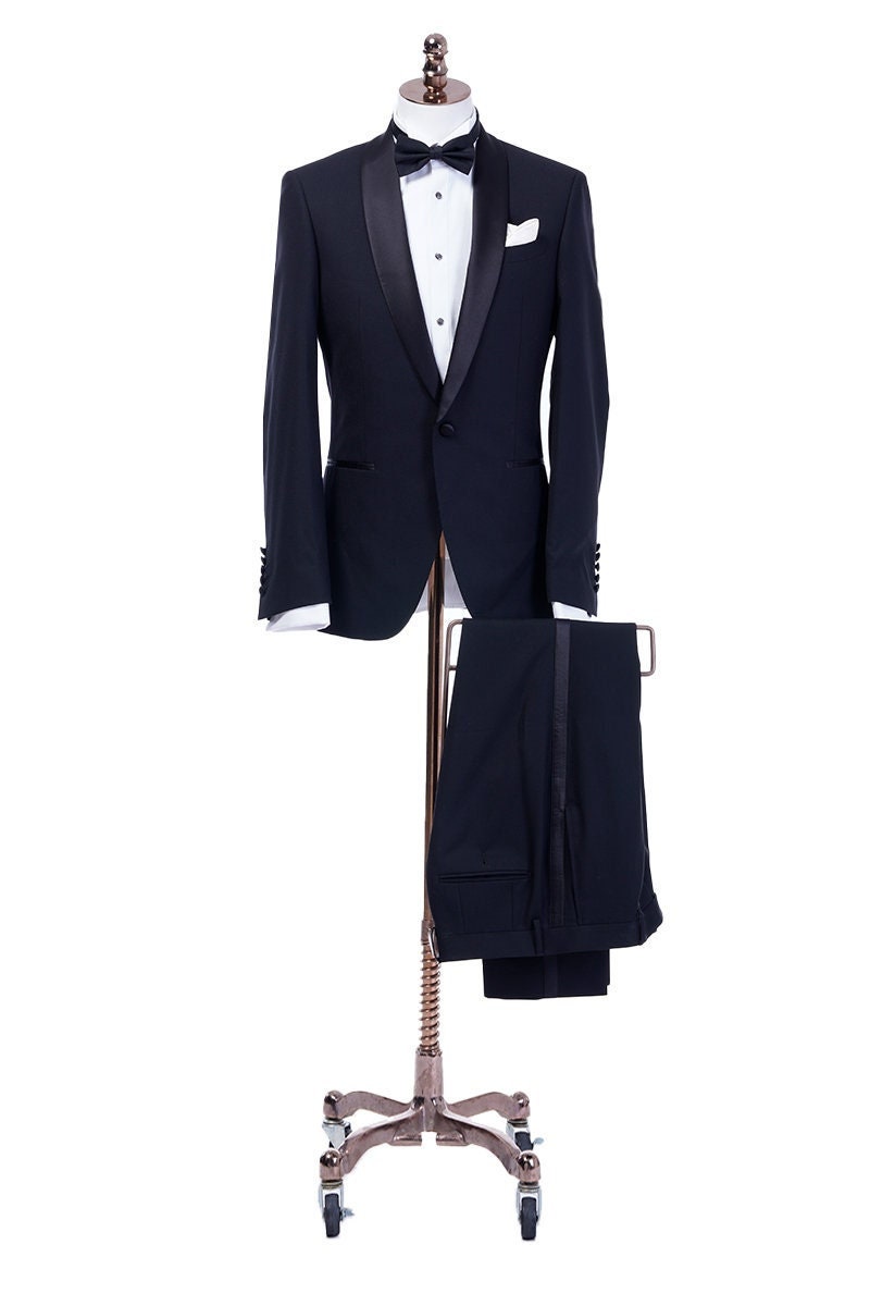 Midnight blue navy tuxedo with black satin shawl lapel. navy blue tuxedo pants with black satin stripe. Black satin covered buttons on this midnight blue dark navy blue tuxedo. Formal wedding tuxedo. Formal wedding tux. Elegant tuxedo.