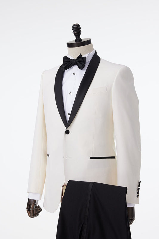 Ivory tuxedo with black shawl lapel. ivory wedding tuxedo. ivory off-white wedding tuxedo with black pants and a black satin accent stripe. Black satin lapel, satin covered buttons, black satin pocket accents on this ivory wedding tuxedo.