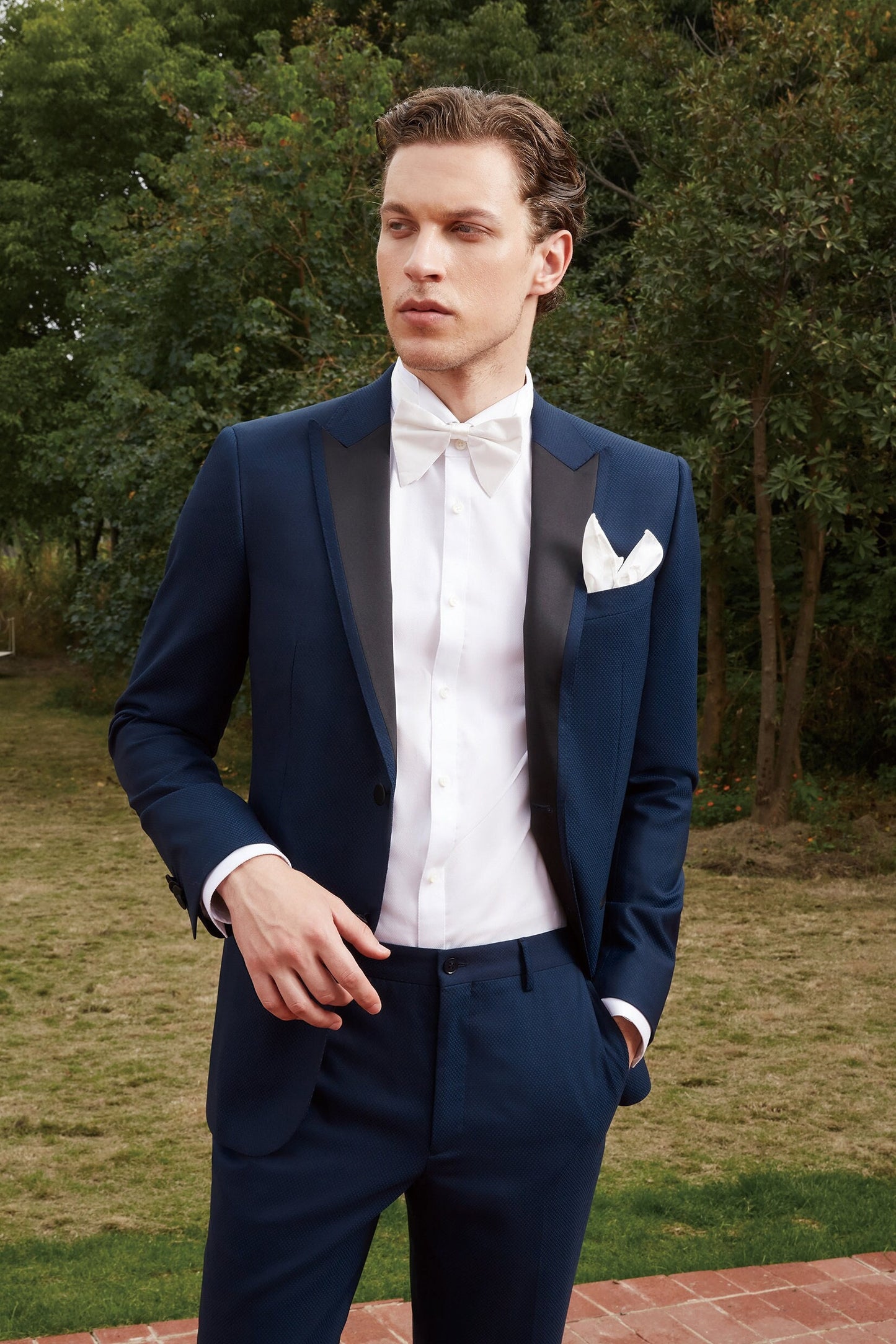 Navy wedding tuxedo with black satin peak lapel. Single breasted navy tux with black satin accents. 2-piece navy wedding tuxedo. Custom navy tuxedo for wedding