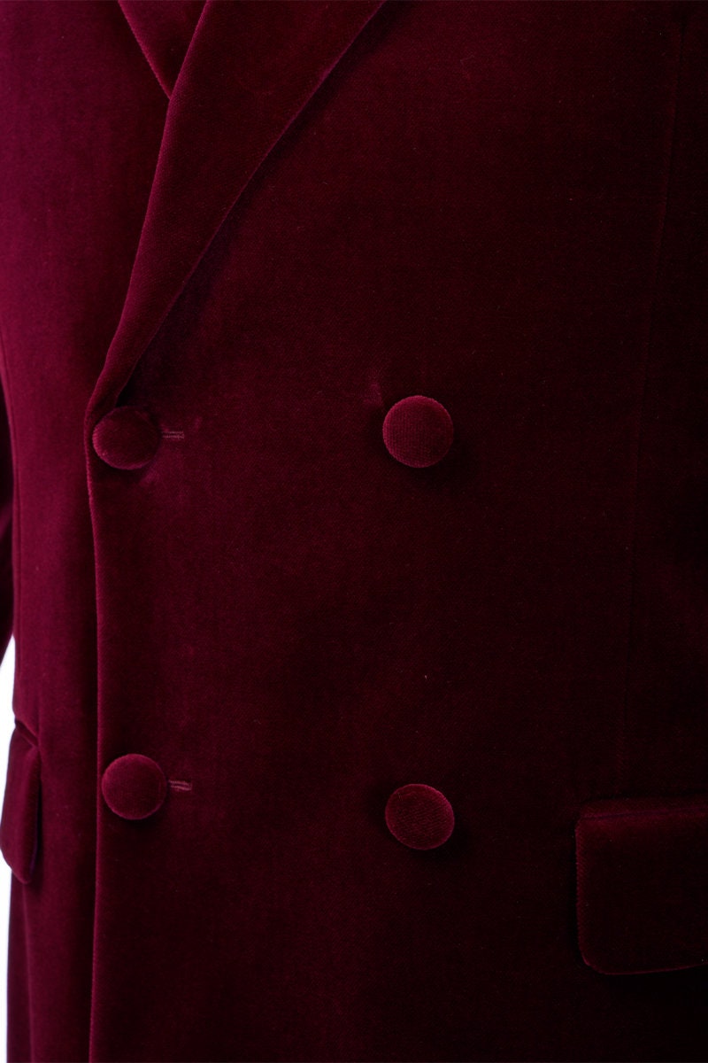 Red velvet tuxedo. Double breasted velvet tuxedo jacket with velvet covered buttons. Dark red maroon velvet tuxedo. Black pants with black satin accent stripe. Velvet wedding tuxedo. Velvet formal tuxedo.