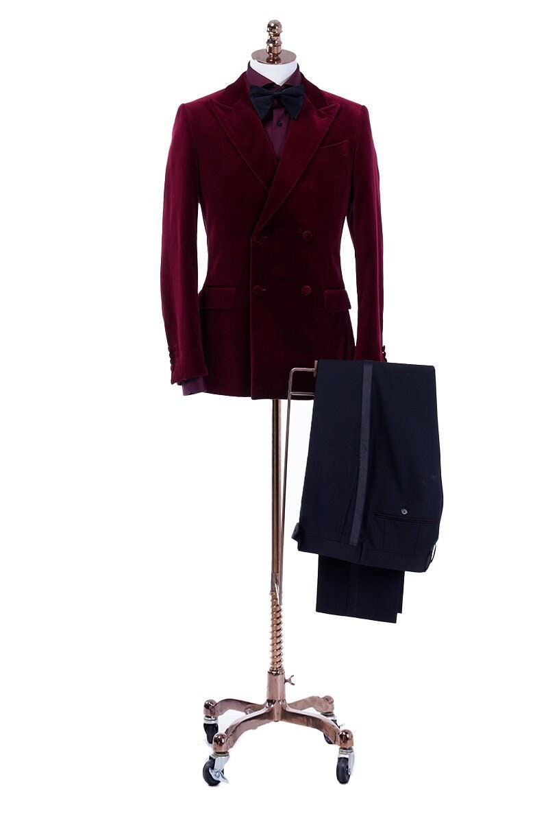 Red velvet tuxedo. Double breasted velvet tuxedo jacket with velvet covered buttons. Dark red maroon velvet tuxedo. Black pants with black satin accent stripe. Velvet wedding tuxedo. Velvet formal tuxedo.