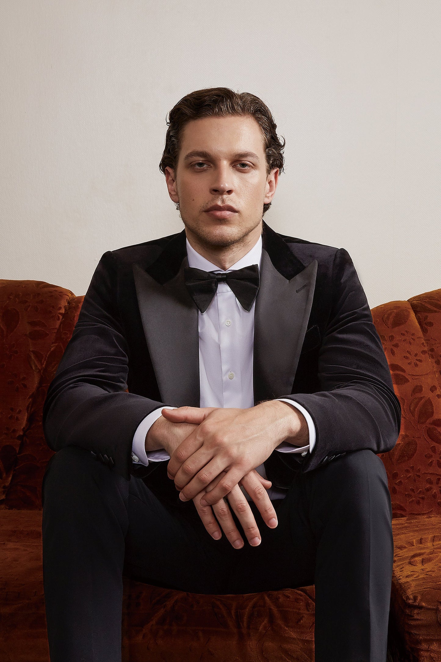 Black velvet wedding tuxedo. Black velvet tux with satin peak lapel and black trousers. Satin covered buttons and satin accents on the pockets on this black velvet formal wedding tuxedo. black velvet tux. formal wedding tuxedo. black tux for groom.