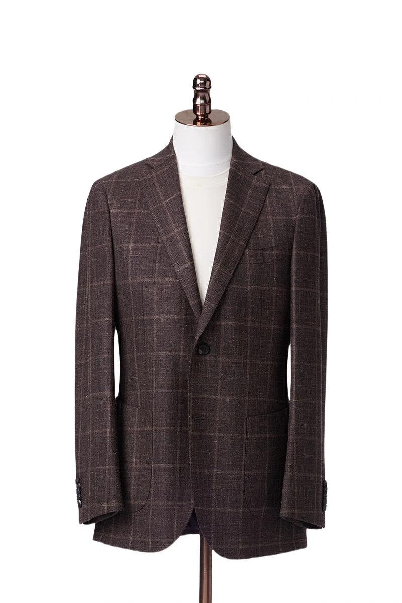 Brown checkered suit jacket on a mannequin against a white background