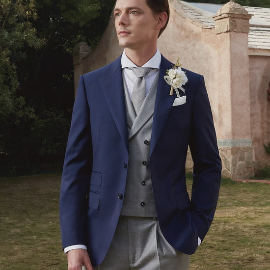 man wearing navy blue and gray wedding suit