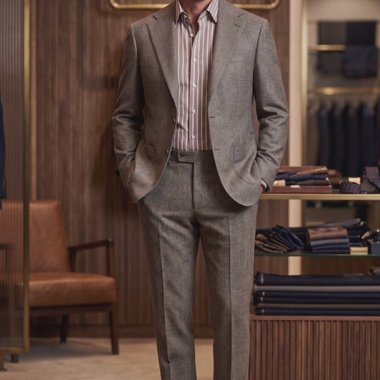 grey plaid mens suit in menswear store