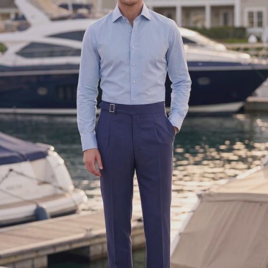 man wearing navy trousers with buckle