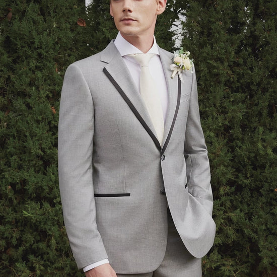 man in grey wedding suit outside