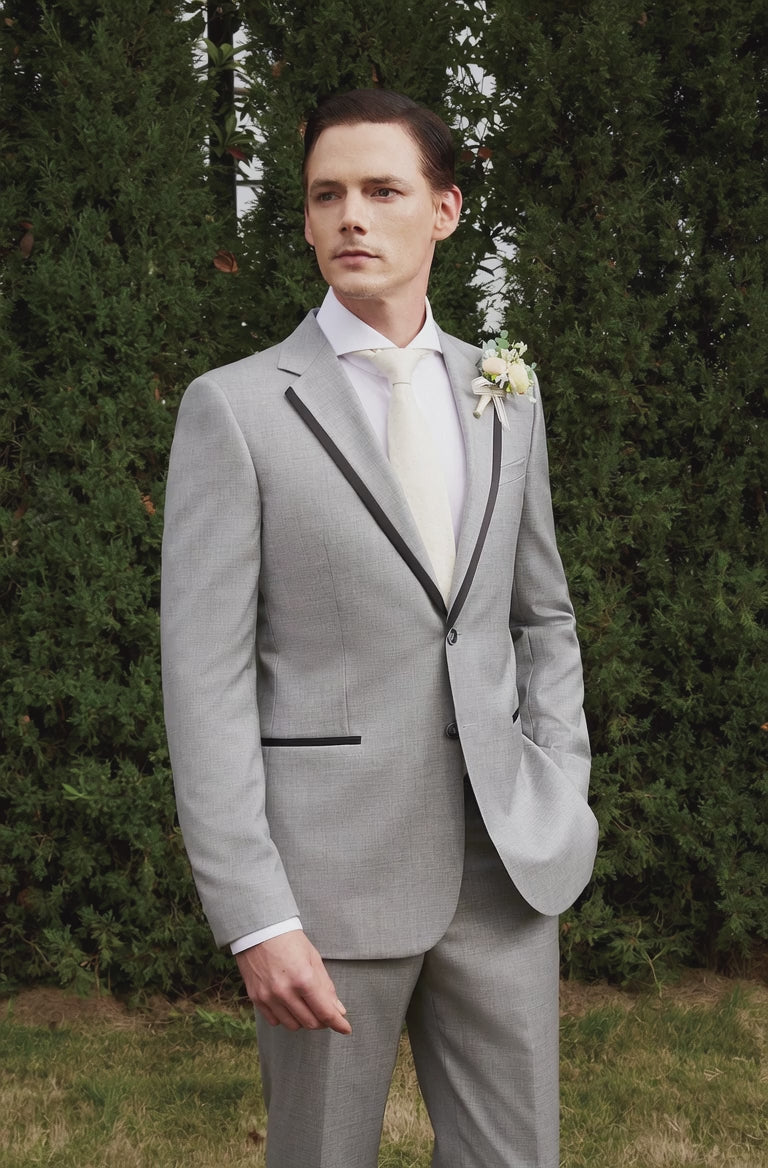 man in grey wedding suit outside